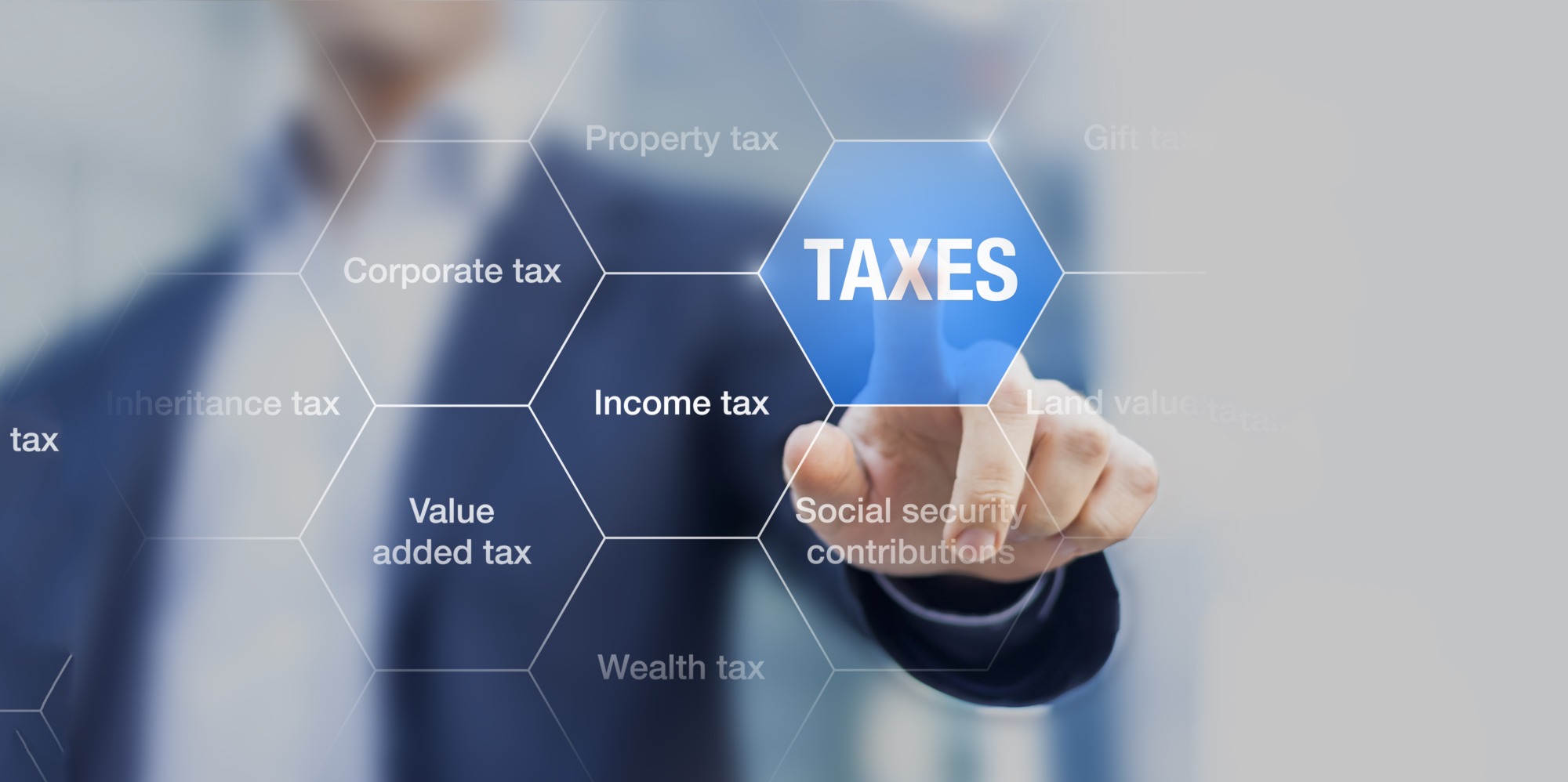 Businessman showing concept of taxes