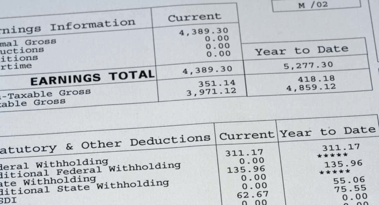 Earnings statement detailing total earnings, deductions, and year-to-date amounts. Key figures include current earnings of $4,389.30.