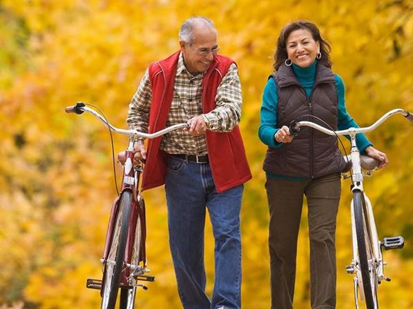 Older couple bicycling