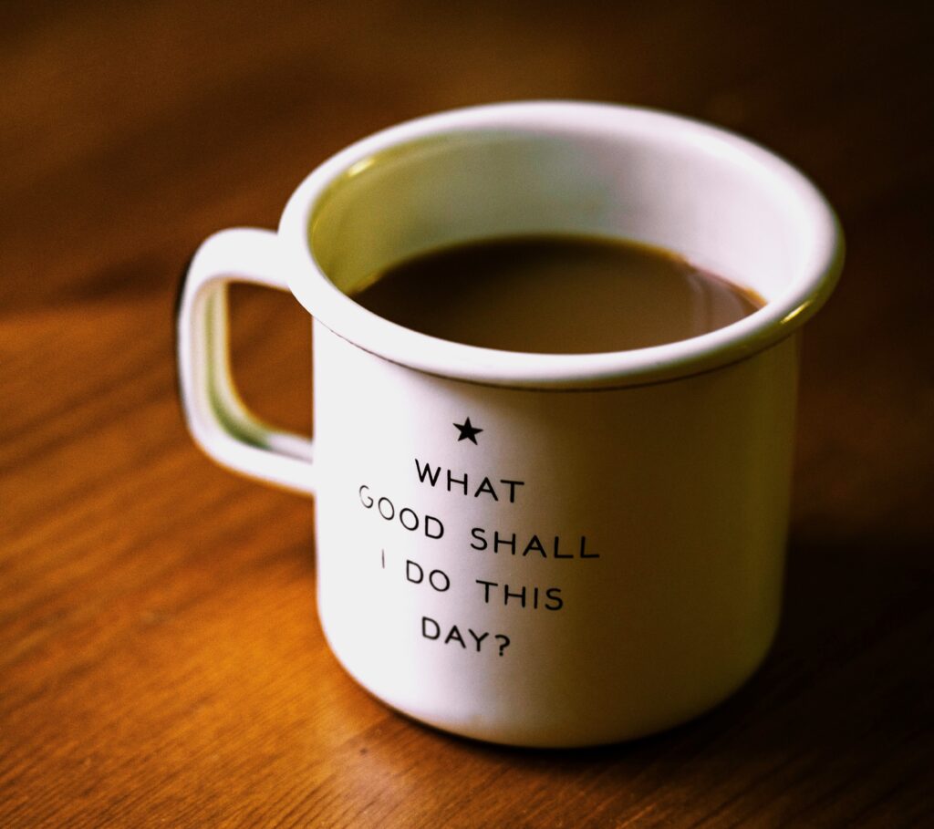 Coffee mug with text asking What good shall I do today? Photo by Nathan Lemon on Unsplash