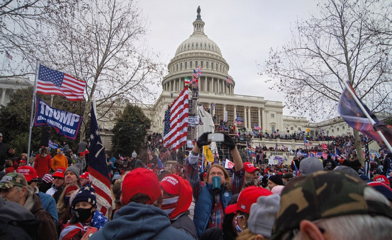 MAGA election deniers storming the U.S. Capitol on January 1 2021.